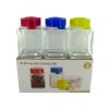 Set of three small glass canisters